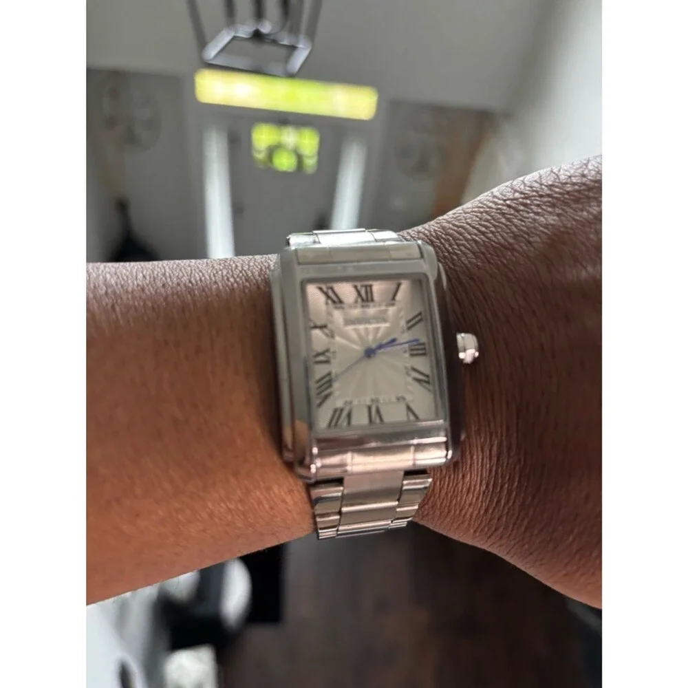 Invicta Silver Watch with Blue Hands and Roman Numerals